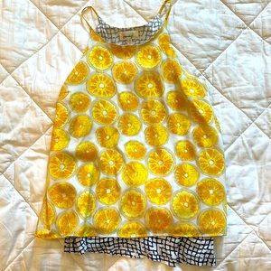 Porridge- sold by Anthropologie. Lemon motif, silk tank with blue checks